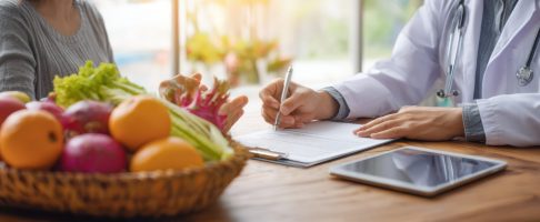 The healthcare professional providing nutritional guidance to a patient.